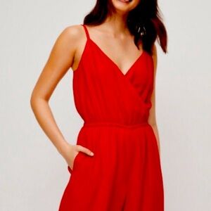 Aritzia melody jumpsuit in red - medium. Never worn